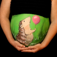 Pregnant Belly Painting Hedgehog with a Balloon